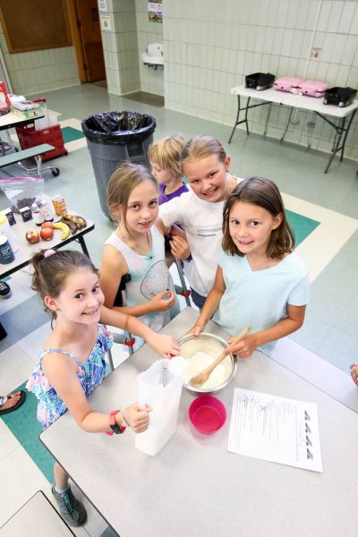 Girls Learning How to Bake at Dream Big Summer Day Camp | Hilltop Denver and Greenwood Village