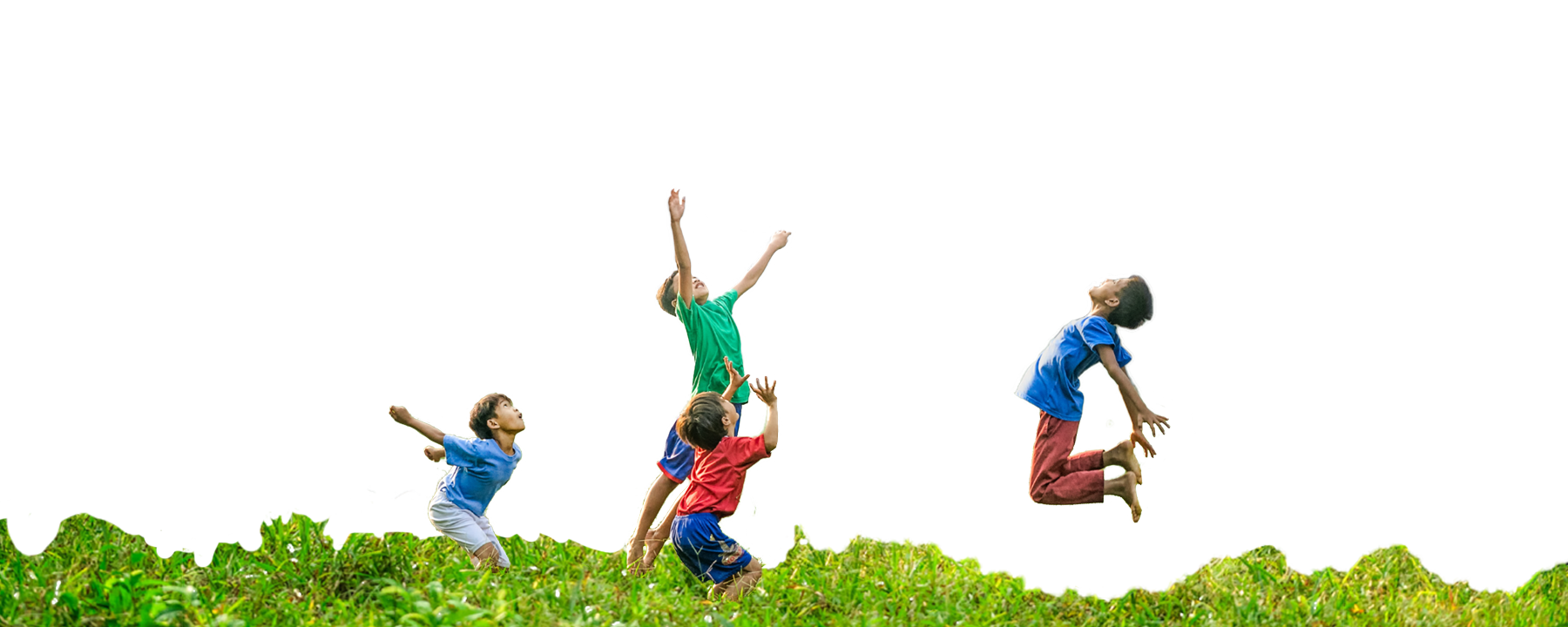 Four Boys Jumping in Grass at Dream Big Summer Day Camp | Hilltop Denver and Greenwood Village