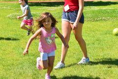Girl Running at Dream Big | Hilltop Denver and Greenwood Village