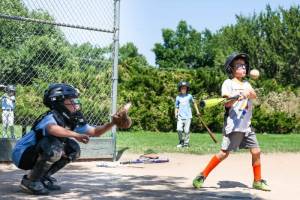Boy Playing Baseball at Dream Big Summer Day Camp | Hilltop Denver and Greenwood Village