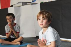 Boy Practicing Yoga at Dream Big | Hilltop Denver and Greenwood Village