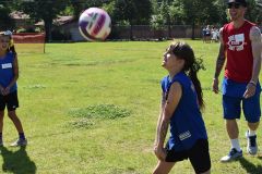 Girl Hitting a Volleyball at Dream Big Summer Day Camp | Hilltop Denver and Greenwood Village