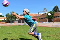 Boy Hitting a Volleyball at Dream Big | Hilltop Denver and Greenwood Village